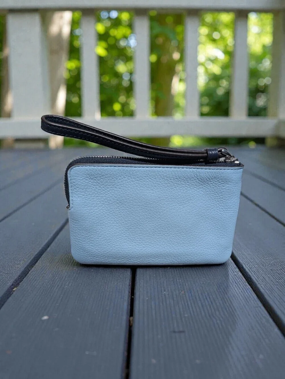 Coach corner zip